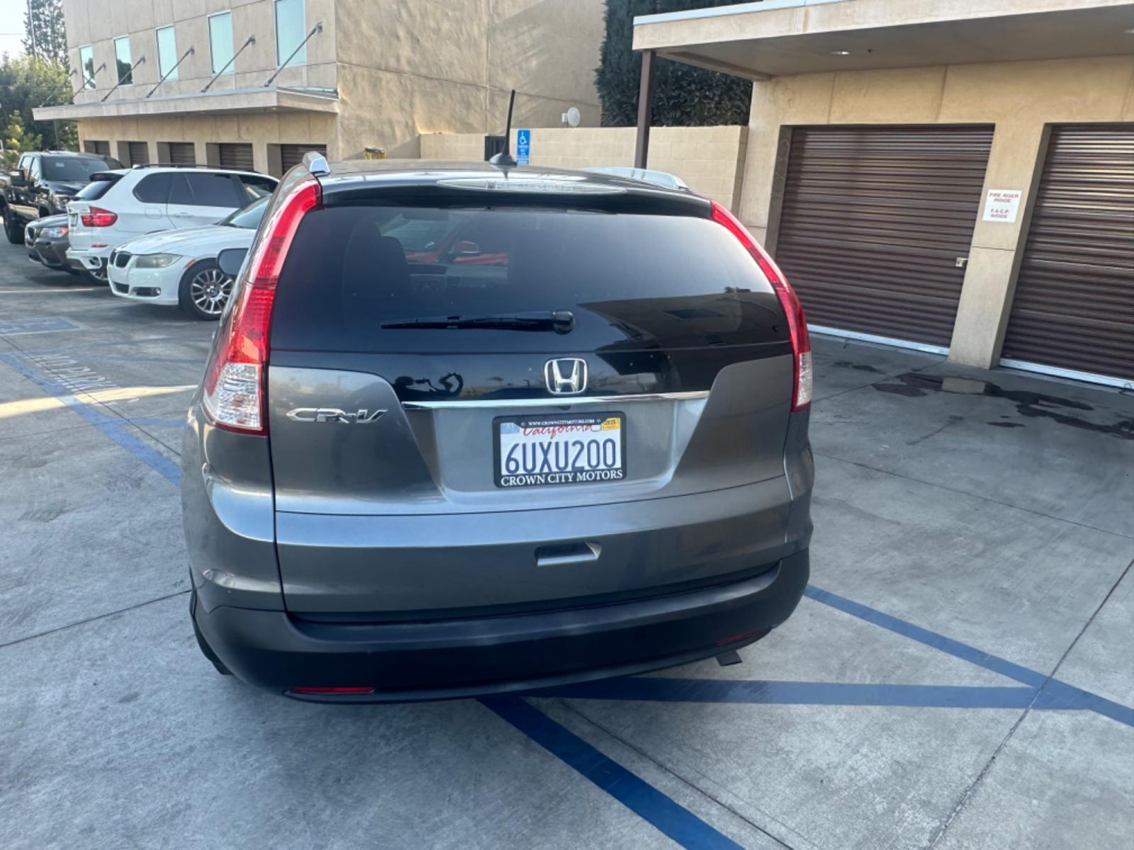 2012 Grey /Gray Honda CR-V EX-L 2WD 5-Speed AT (JHLRM3H78CC) with an 2.4L L4 DOHC 16V engine, 5-Speed Automatic transmission, located at 30 S. Berkeley Avenue, Pasadena, CA, 91107, (626) 248-7567, 34.145447, -118.109398 - Moon-roof! Leather seats! This 2012 Honda CR-V EX-L 2WD 5-Speed AT looks and drives good. - Photo #3
